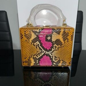 Brandon Blackwood Fuschia Snakeskin Kendrick Trunk